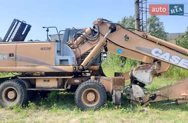 Колісний екскаватор Case Construction WX 210 2009 в 