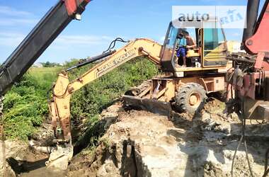 Экскаватор погрузчик Case IH 688 1994 в 