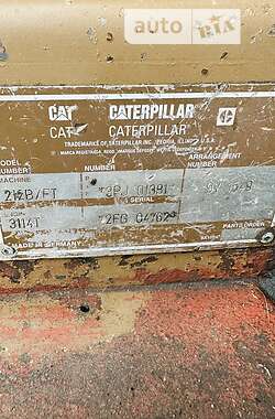 Колісний екскаватор Caterpillar 212 1995 в Жовкві