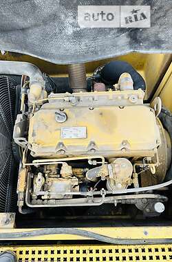 Колісний екскаватор Caterpillar 212 1995 в Жовкві