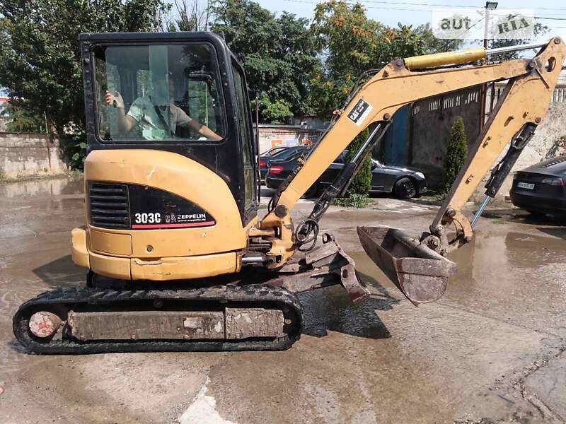 Экскаватор погрузчик Caterpillar 303 2007 в Одессе