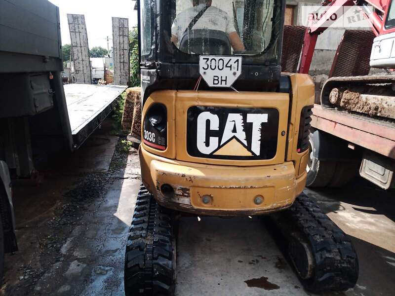 Экскаватор погрузчик Caterpillar 303 2007 в Одессе