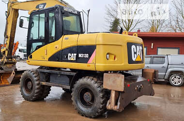 Колісний екскаватор Caterpillar 313 2010 в Одесі