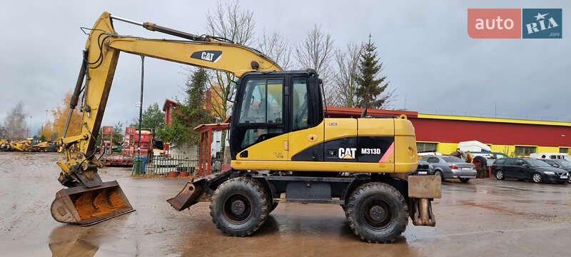 Колесный экскаватор Caterpillar 313 2010 в Одессе