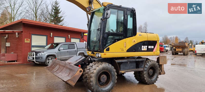 Колесный экскаватор Caterpillar 313 2010 в Одессе