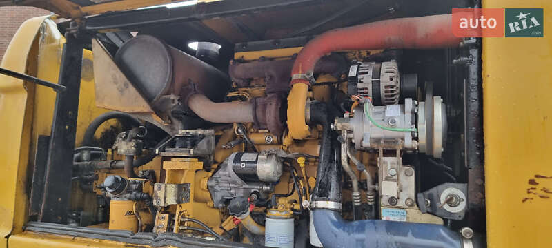 Колесный экскаватор Caterpillar 313 2010 в Одессе