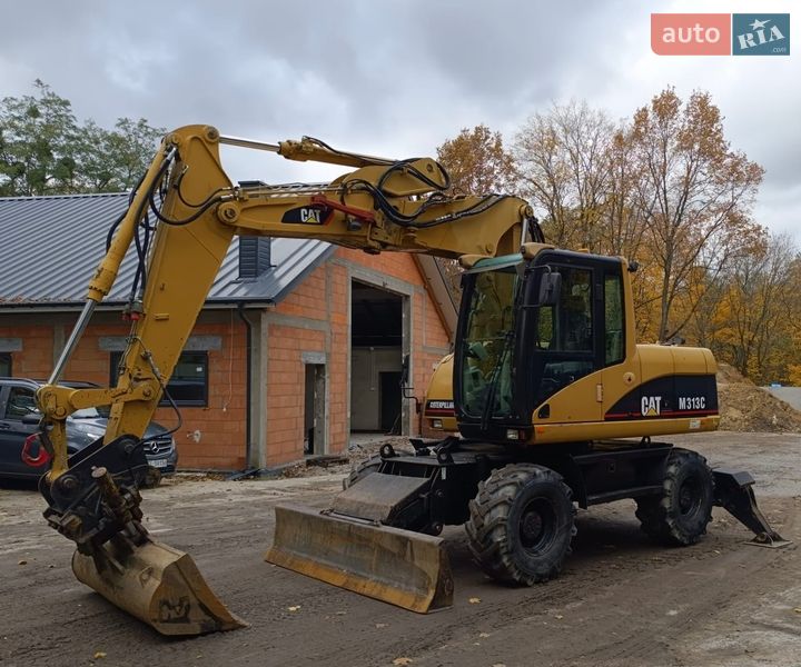 Колесный экскаватор Caterpillar 313 2007 в Львове
