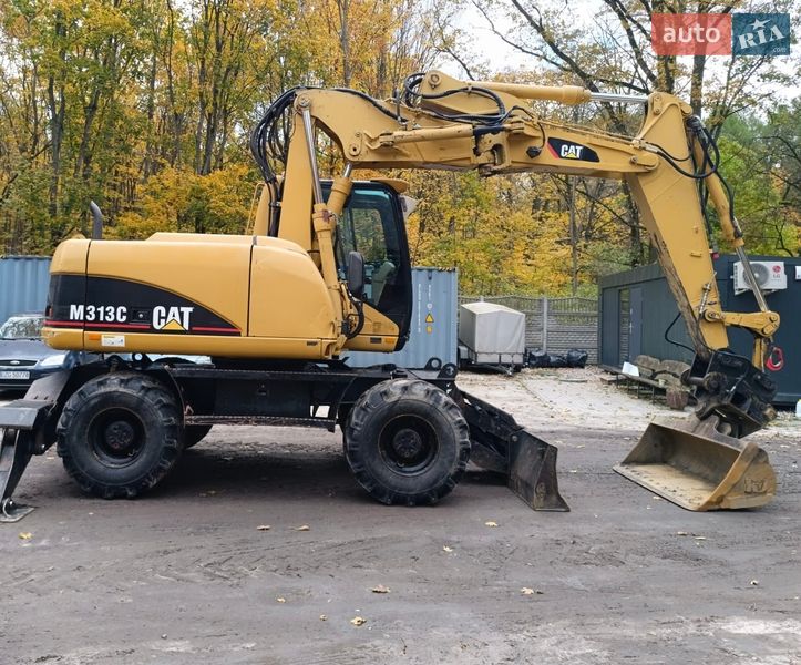Колесный экскаватор Caterpillar 313 2007 в Львове