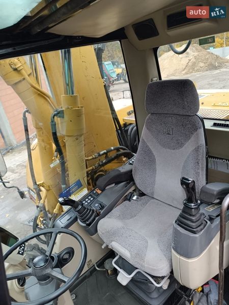 Колесный экскаватор Caterpillar 313 2007 в Львове