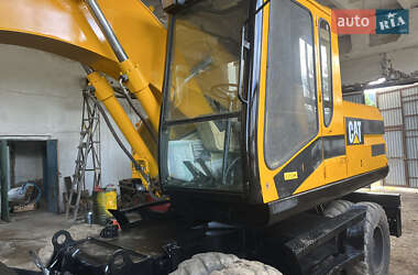 Колесный экскаватор Caterpillar 315 2001 в 