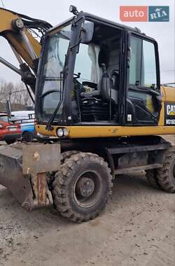 Колісний екскаватор Caterpillar 316 2010 в Львові