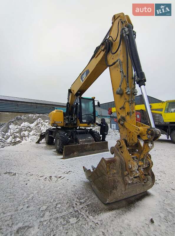 Колесный экскаватор Caterpillar 316 2009 в Николаеве