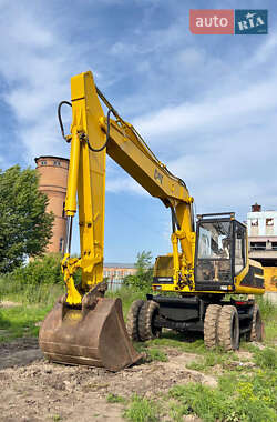 Колесный экскаватор Caterpillar 318 1996 в Белой Церкви
