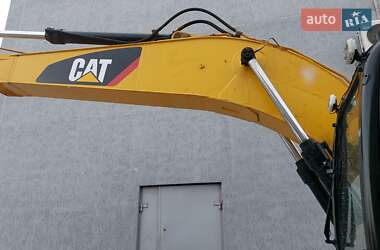 Гусеничный экскаватор Caterpillar 320 2007 в 