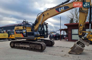 Гусеничный экскаватор Caterpillar 320 2014 в 