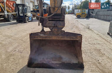 Гусеничный экскаватор Caterpillar 320 2013 в 