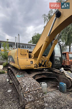 Гусеничный экскаватор Caterpillar 322 2006 в 