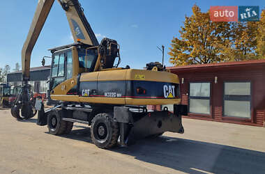 Экскаватор погрузчик Caterpillar 322 2007 в 