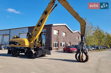Экскаватор погрузчик Caterpillar 322 2007 в 