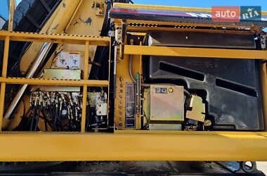 Экскаватор погрузчик Caterpillar 322 2007 в 