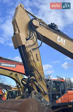 Гусеничный экскаватор Caterpillar 323 2015 в 