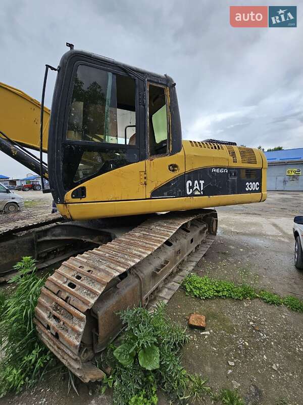 Экскаватор погрузчик Caterpillar 330 2008 в 
