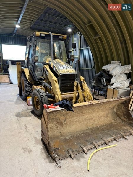 Колісний екскаватор Caterpillar 424 2007 в Хмельницькому