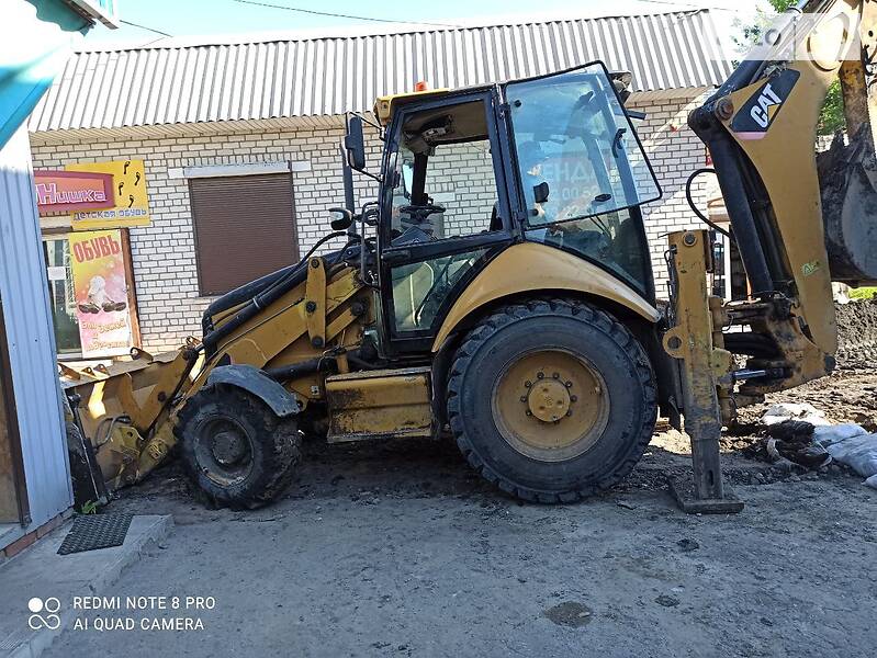 Екскаватор навантажувач Caterpillar 428E 2008 в Ірпені