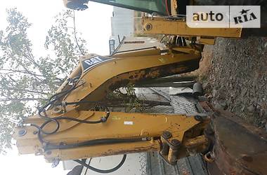 Экскаватор погрузчик Caterpillar 432 2004 в 