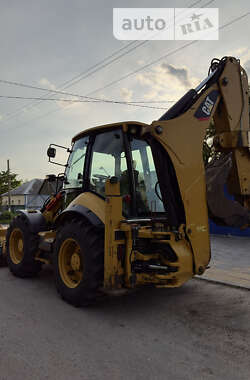Экскаватор погрузчик Caterpillar 444 2014 в 