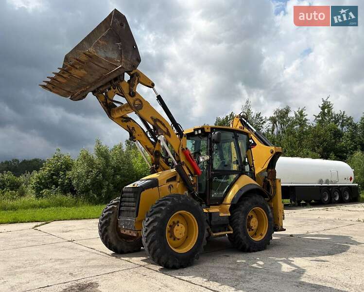 Экскаватор погрузчик Caterpillar 444 2014 в 