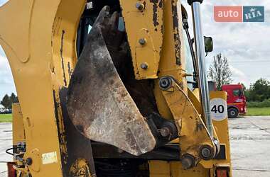 Экскаватор погрузчик Caterpillar 444 2014 в 