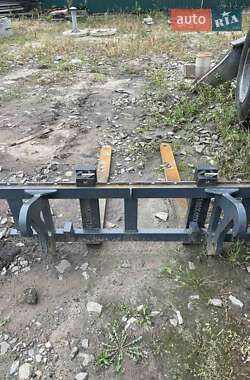 Фронтальный погрузчик Caterpillar 908 2011 в 