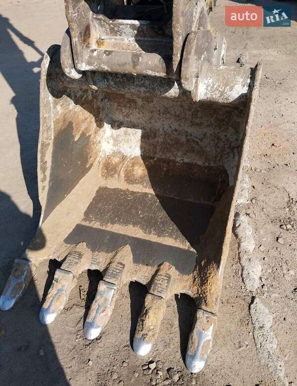 Екскаватор навантажувач Caterpillar M312 2002 в Житомирі