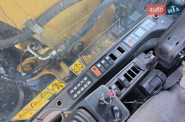 Колесный экскаватор Caterpillar M315 2009 в 
