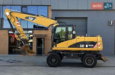 Колесный экскаватор Caterpillar M315 2009 в 