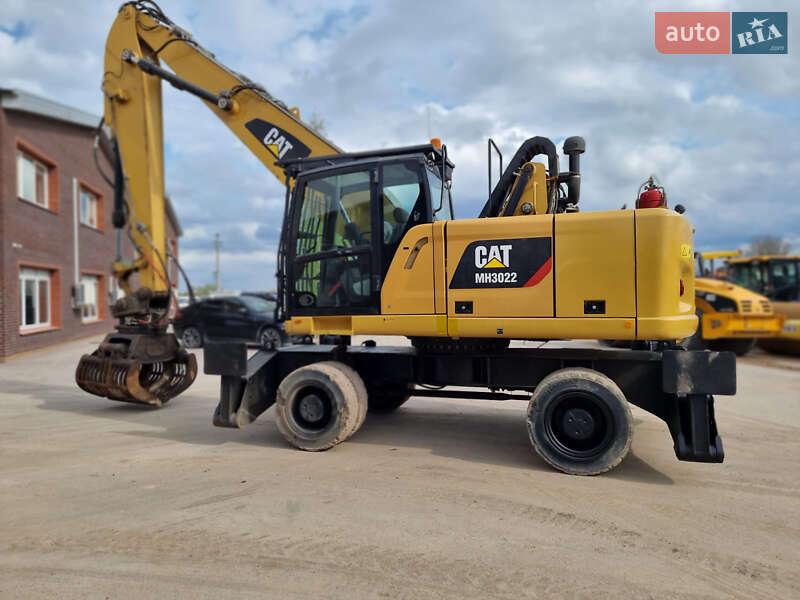 Экскаватор погрузчик Caterpillar MH 3022 2018 в Одессе