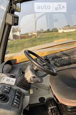 Телескопический погрузчик Caterpillar T 2009 в 
