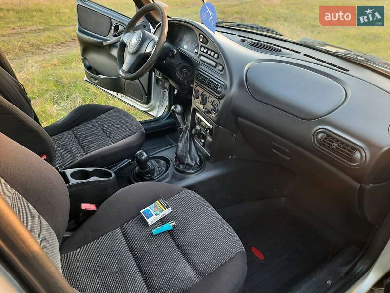 Внедорожник / Кроссовер Chevrolet Niva 2011 в Згуровке