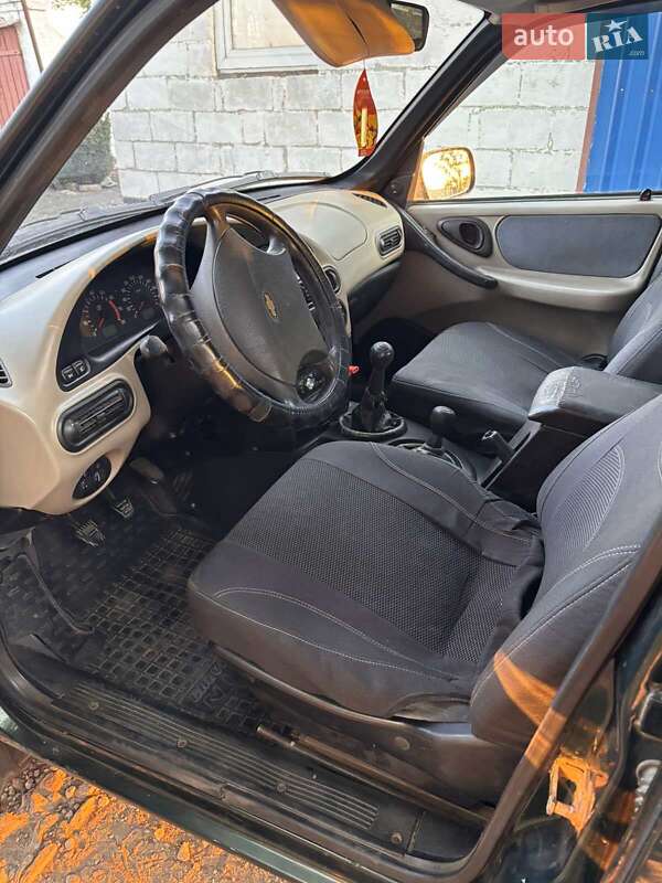 Позашляховик / Кросовер Chevrolet Niva 2005 в Кам'янському фото 9 Позашляховик / Кросовер Chevrolet Niva 2005 в Кам'янському