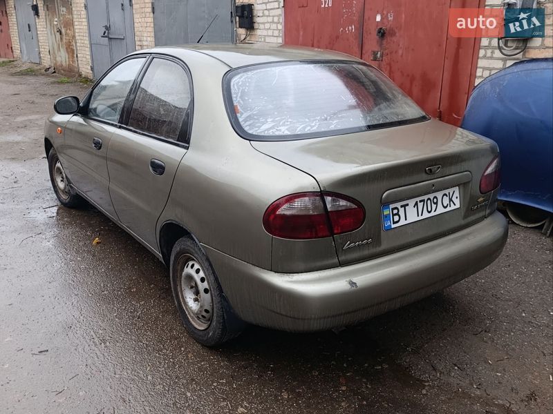 2005 Daewoo Lanos, VIN Y6DTF69YD5W242050:plate — фото 1 (autoria)