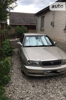 Лифтбек Daihatsu Applause 1999 в 