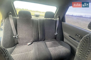 Лифтбек Daihatsu Applause 1999 в 