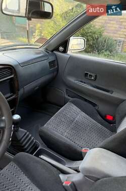 Лифтбек Daihatsu Applause 1999 в 