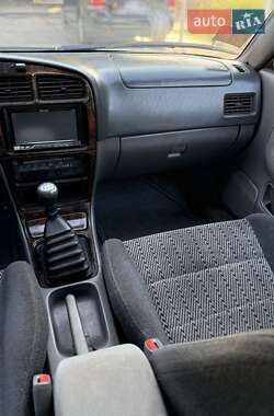 Лифтбек Daihatsu Applause 1999 в 