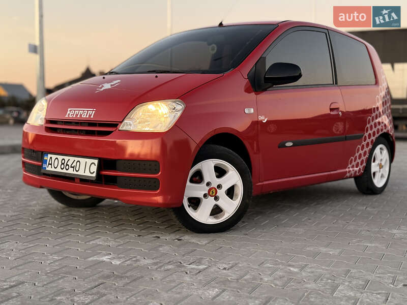 Купе Daihatsu Cuore 2006 в 