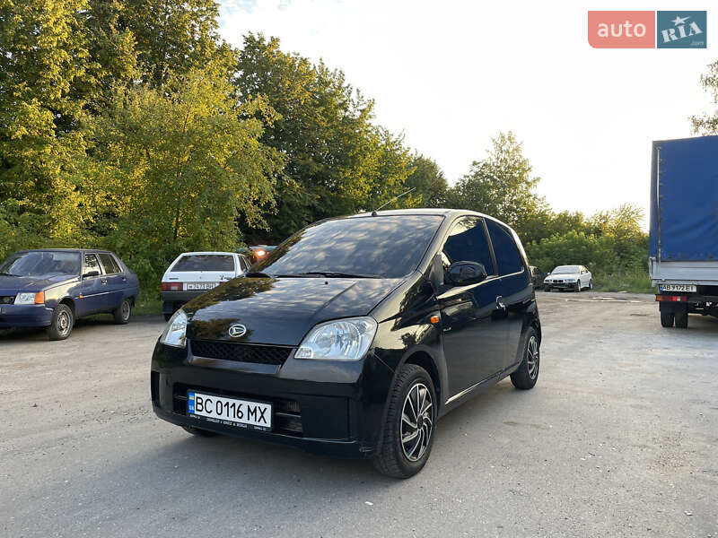 Хэтчбек Daihatsu Cuore 2004 в 