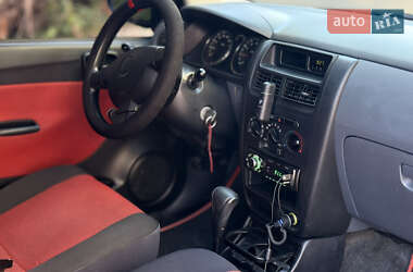 Купе Daihatsu Cuore 2006 в 