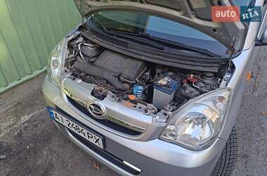 Хэтчбек Daihatsu Cuore 2010 в 