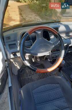 Хэтчбек Daihatsu Cuore 1988 в 